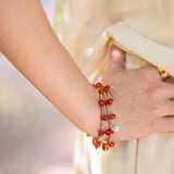 Hope gold stretch bracelet with teardrop glass beads red