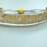 Seed Bead Islamorada Bracelet - White With Gold Lettering- Love Is Project