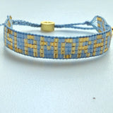Seed Bead Islamorada Bracelet - Sky Blue With Gold Letters- Love Is Project