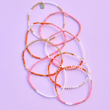 Pura Vida Bracelets - Mixed Seed Bead Stretch Bracelets -  Pack of 8 - Orange