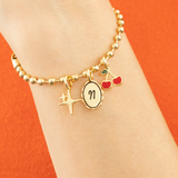 Charm Garden Gold Bracelet - Lucky Feather