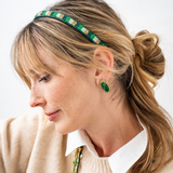 Daphne oval green stone post earrings framed in brass