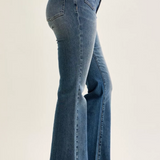 Mid Rise Flare Leg Medium Blue Jeans With Flap Pockets by Judy Blue